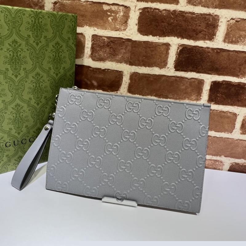 G*u*i clutch bags
